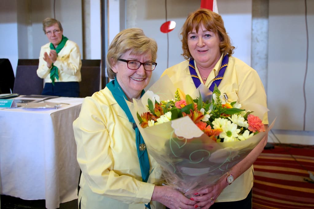Dolores Farnan receives the Lifetime Award from Chief Commissioner Emily McCann.