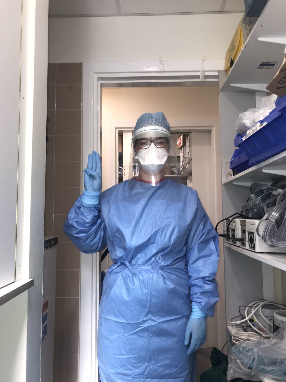 An image of Sarah in full PPE gear