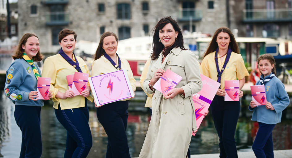 Senator Rebecca Moynihan holding a copy of the PEPP Programme along with members of the Storrws posing on the dock.